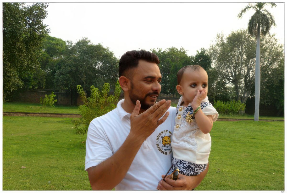 En retraversant les jardins, jolie rencontre avec ce papa et son jeune fils qui nous envoie des baisers pour nous dire au revoir.