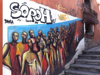 Coupeurs de canne à sucre du temps de l'esclavage.
J'ai choisi de vous présenter ce Street-art dont les couleurs sont assorties au mur et à son environnement.
Photographie prise à Basse Terre en Guadeloupe.