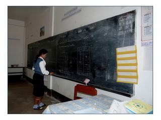 Exercice de maths au tableau.