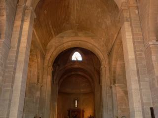 Un prieuré bénédictin pourrait être à l’origine de l’église Notre Dame de Nazareth au XIe siècle. Mais la partie primitive, constituée d’une croix latine: l’abside, le transept, la nef, ne date que du XIIe siècle. Dès le XIIe siècle, l’église fut agrandie: les nefs latérales sont opposées aux murs extérieurs en demi-berceau. À partir du XVe siècle, les familles et les corporations de Valréas édifièrent de nombreuses chapelles.