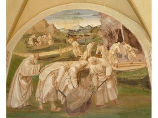 Benoît construit le monastère du Mont Cassin, fresque due à Signorelli L'esprit du Mal persécute saint Benoit et son oeuvre de mille manières: ici il a fallu éteindre un incendie et extraire une idole du sol.